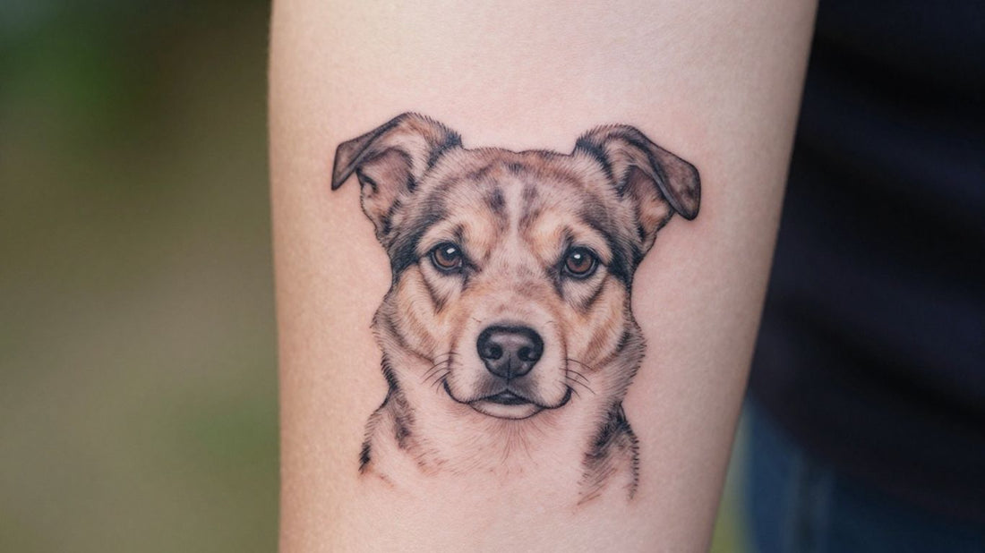Minimalist dog portrait tattoo on an arm.